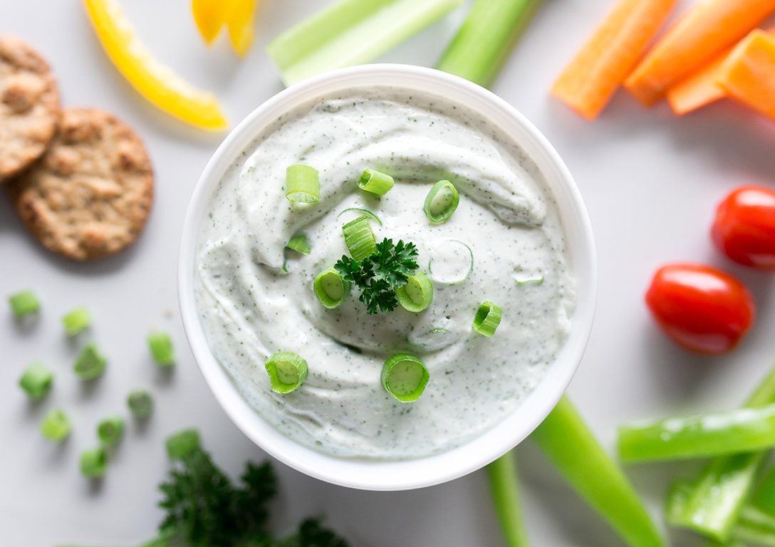 Dipping sauce with crackers and veggies
