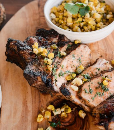 Grilled bone-in pork chop with a hint of pink